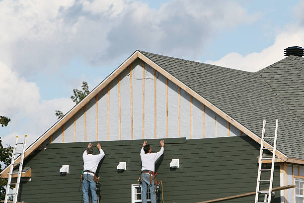 Professional Siding Repair technician working in Midland, PA